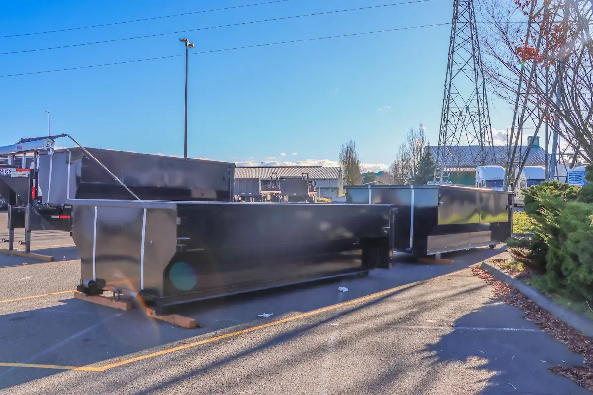 Roll-off dumpster ready for waste disposal at job site for 12 Yard Dumpster Rental in Midland